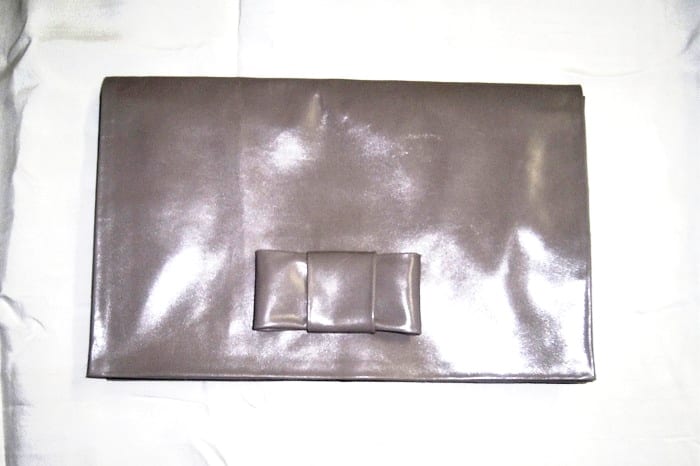Pochette in pelle di capretto, Borse
